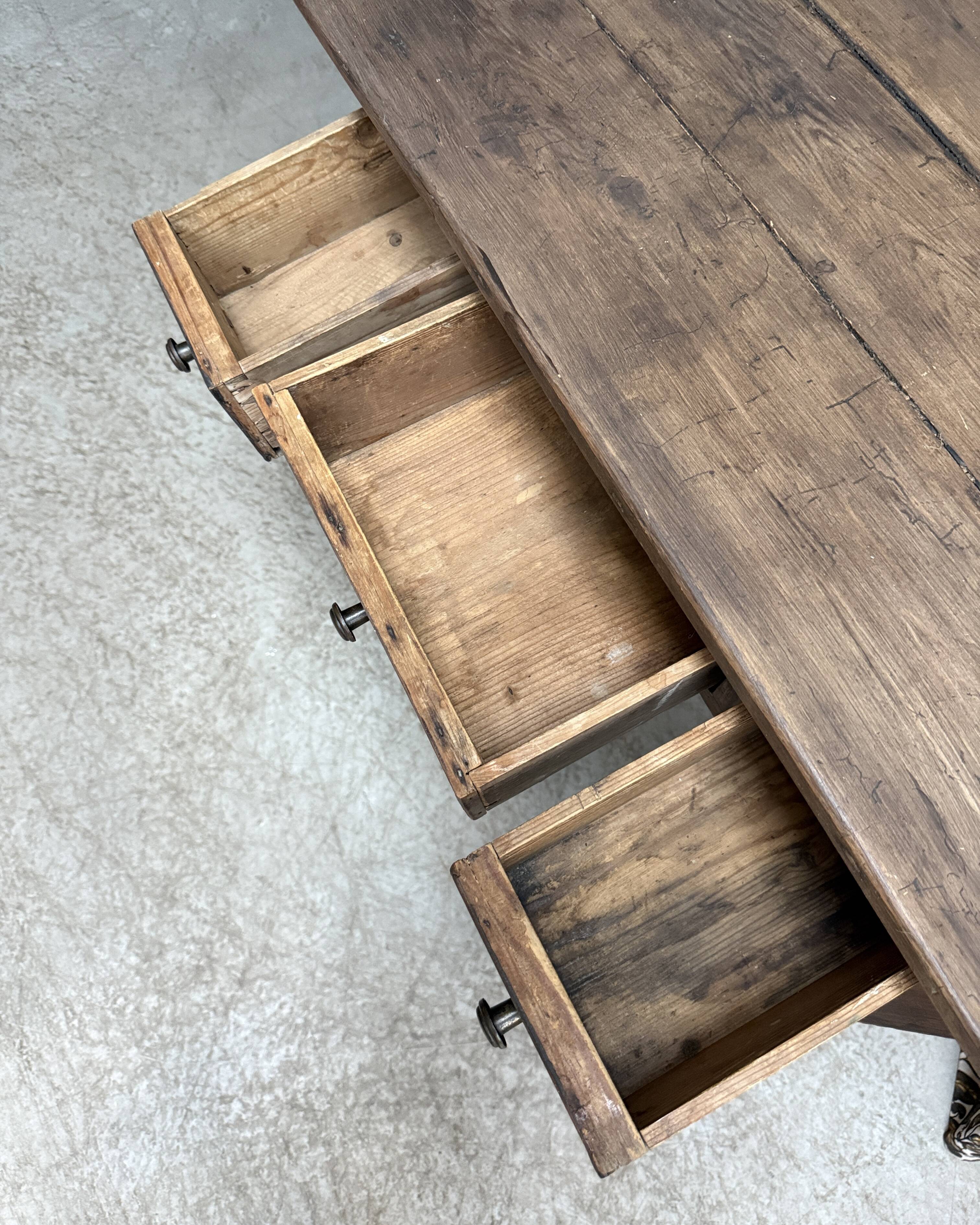 Small antique desk on wheels