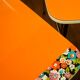 Pair of orange Formica "Tublac" chairs