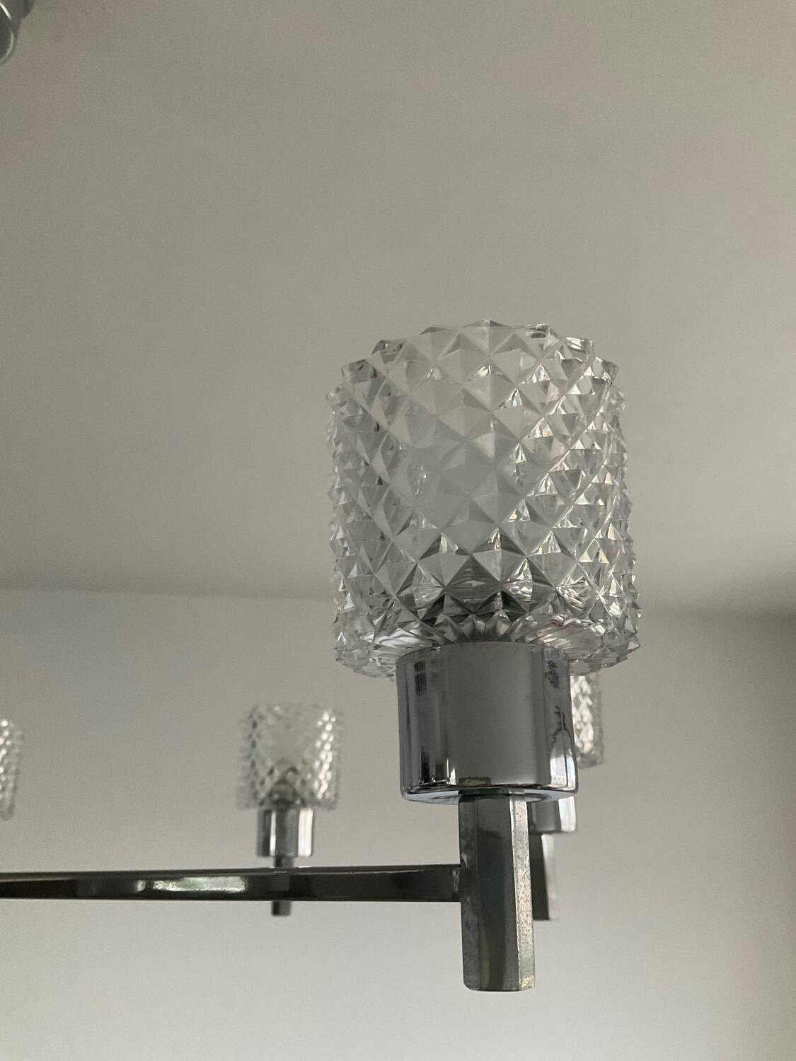 Vintage Italian chandelier from the 60s in chromed metal and glass