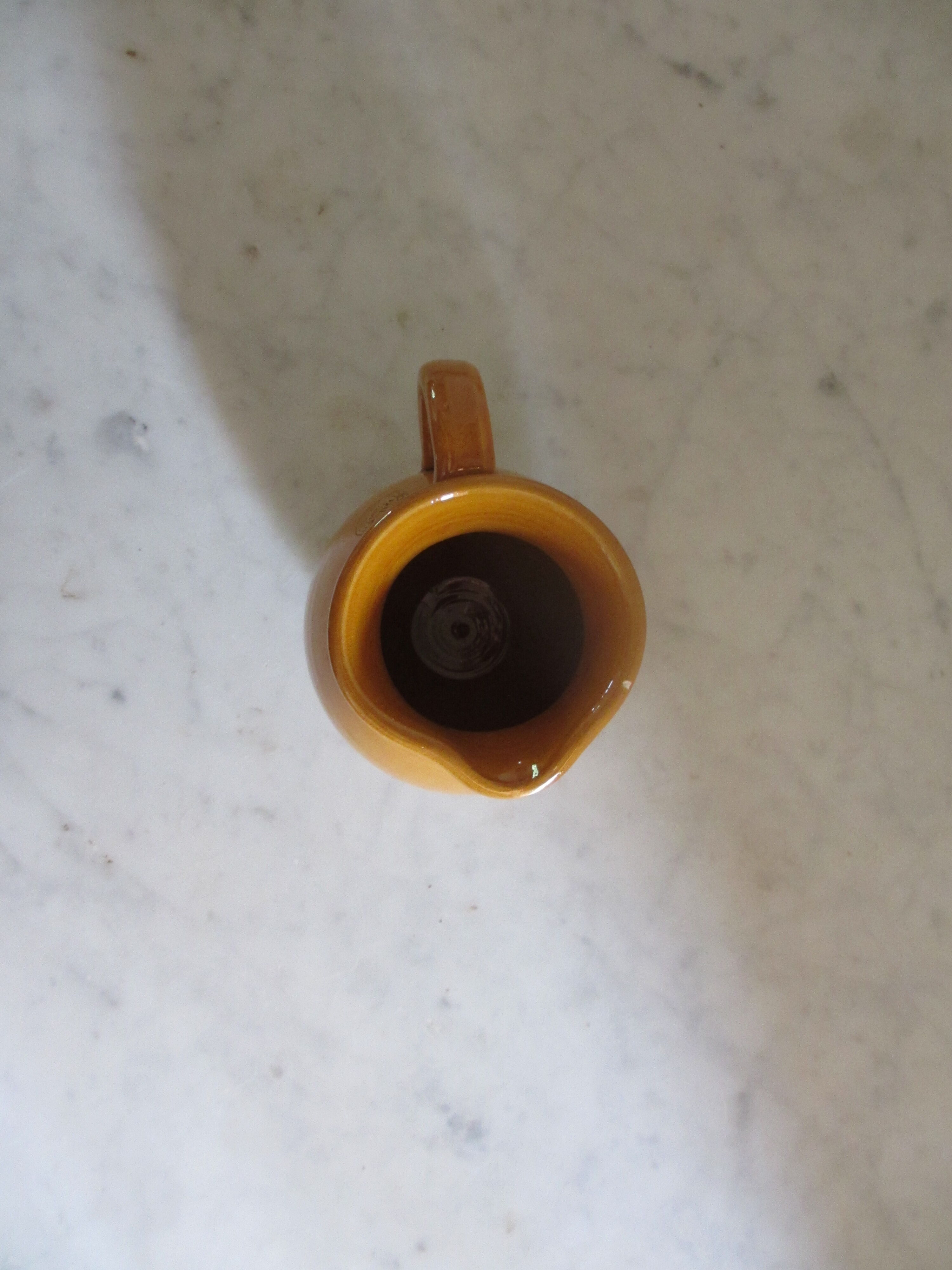 Enamelled earthenware pitcher