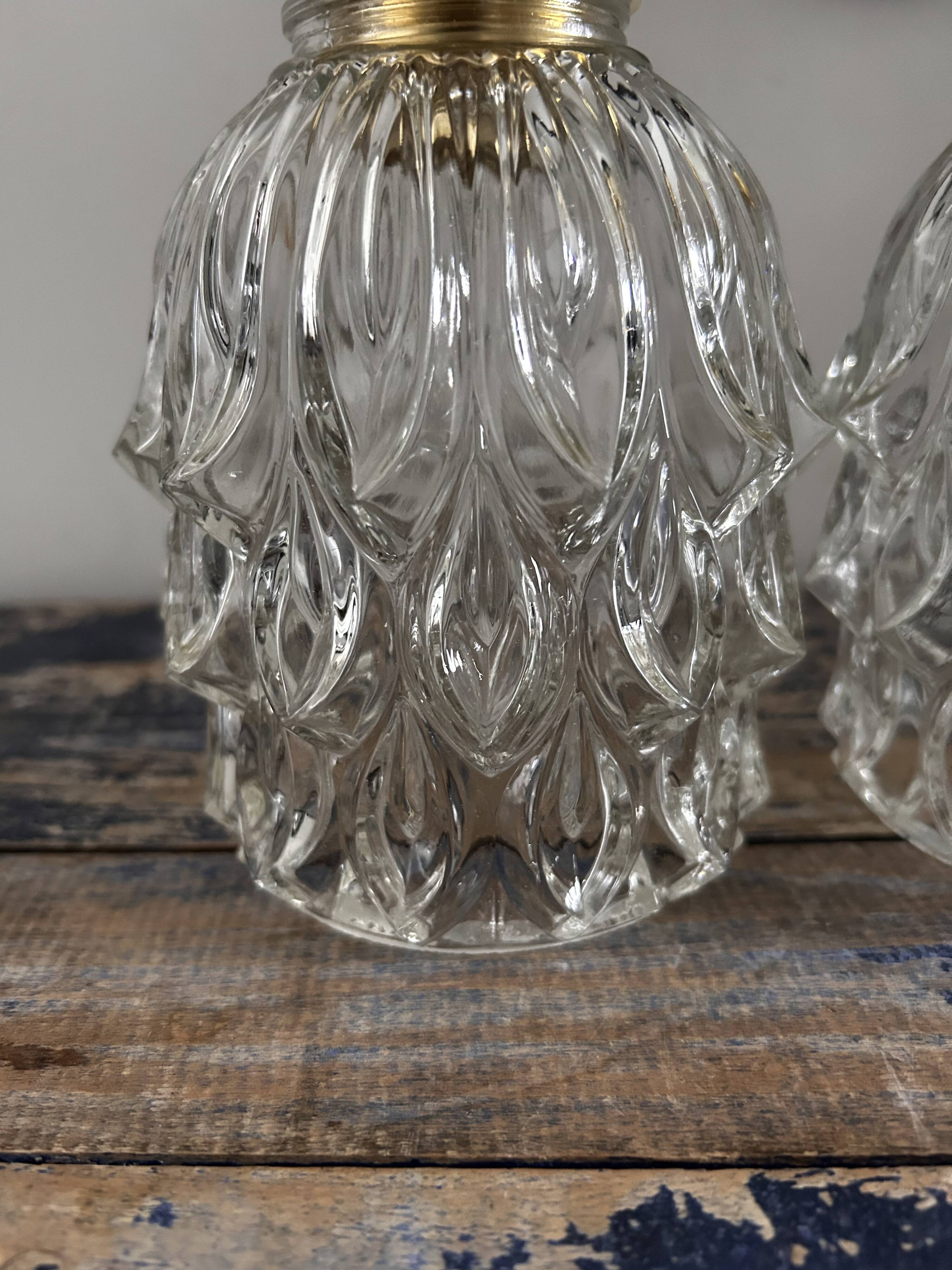 Pair of chiseled glass wall sconces