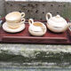 Former breakfast service at the earthenware bed with tray