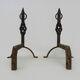 Large pair of cast iron chimney chenets. France 19th century