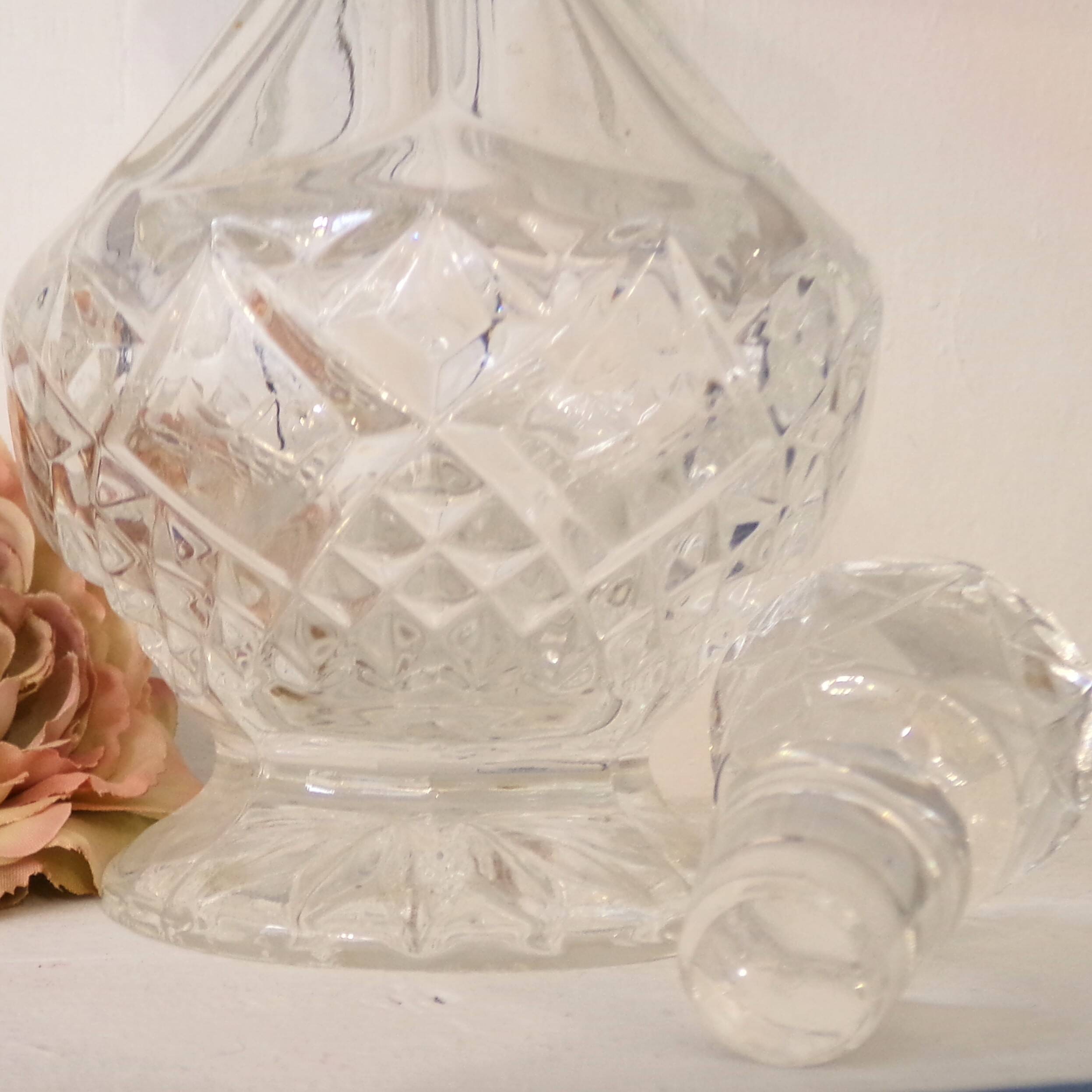 Cut glass liqueur carafe with a faceted stopper