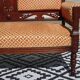 Old bench in wood and orange velvet