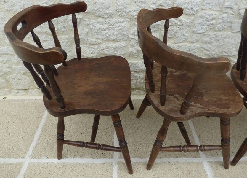 4 solid wood western-style "smoker's chairs" made of oak