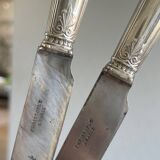 12 antique Christofle knives.