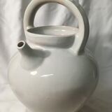 Old chevrette / pitcher in white earthenware