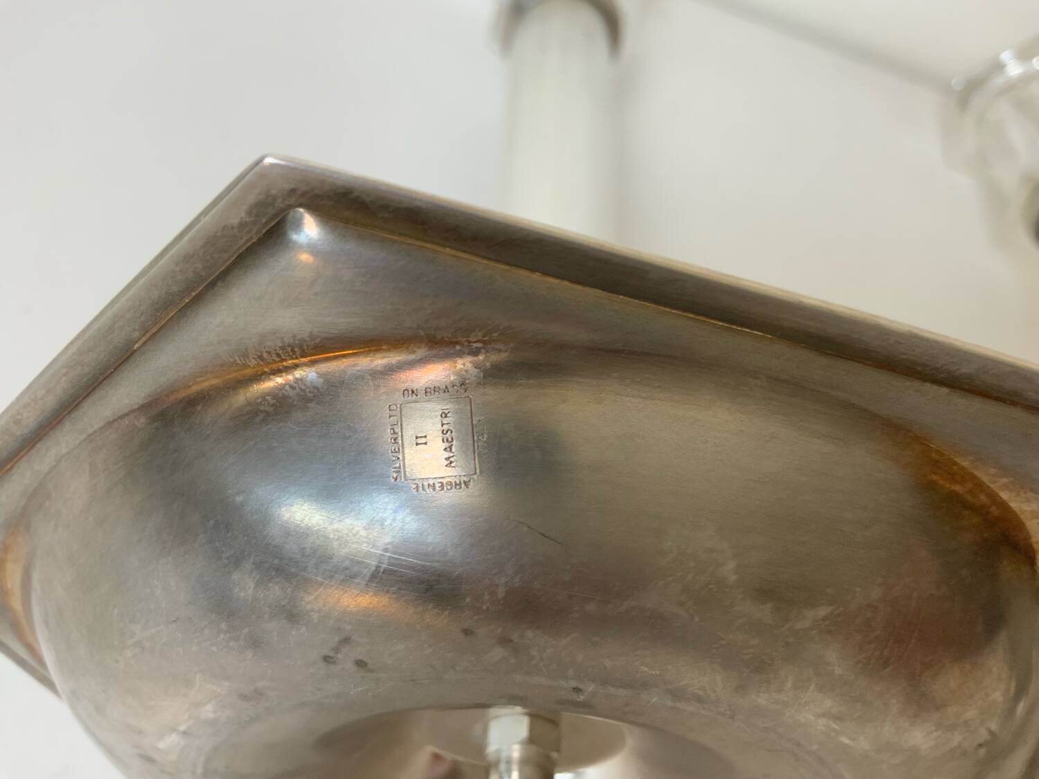 Pair of silver-plated metal candlesticks