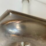 Pair of silver-plated metal candlesticks