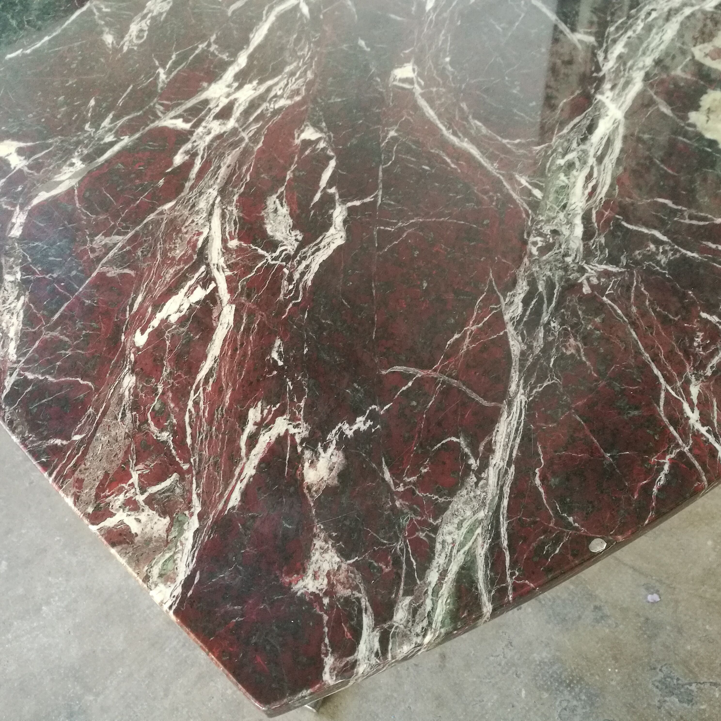 Table, chrome foot, red marble