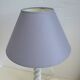 White and grey wooden foot-laying lamp, grey lampshade