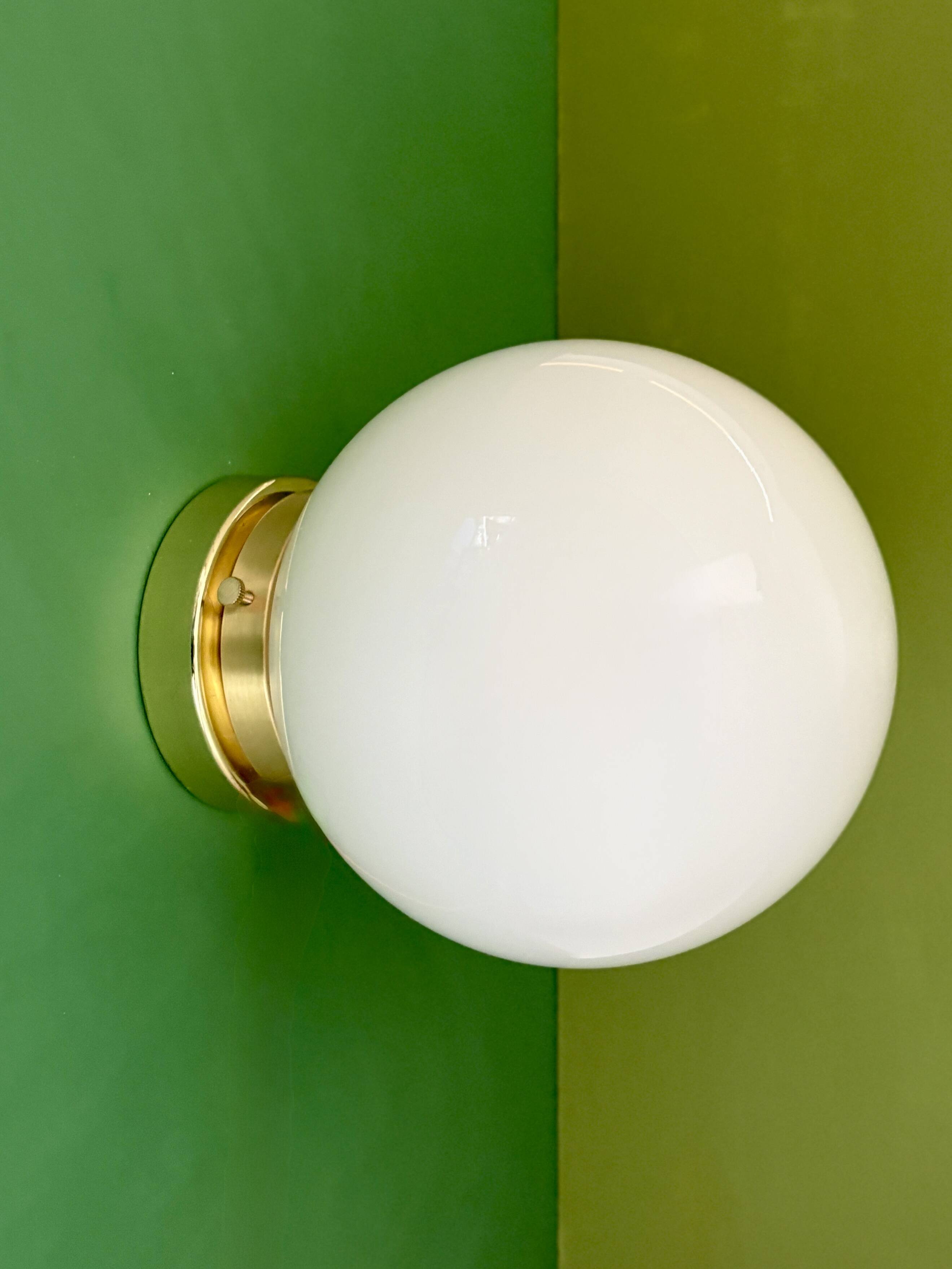 Vintage wall or ceiling light globe in white opaline.