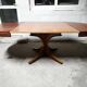 Rosewood extendable round table by Luigi Bartolini. vintage dining room 1960/70