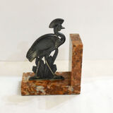 Art Deco bird bookend on marble