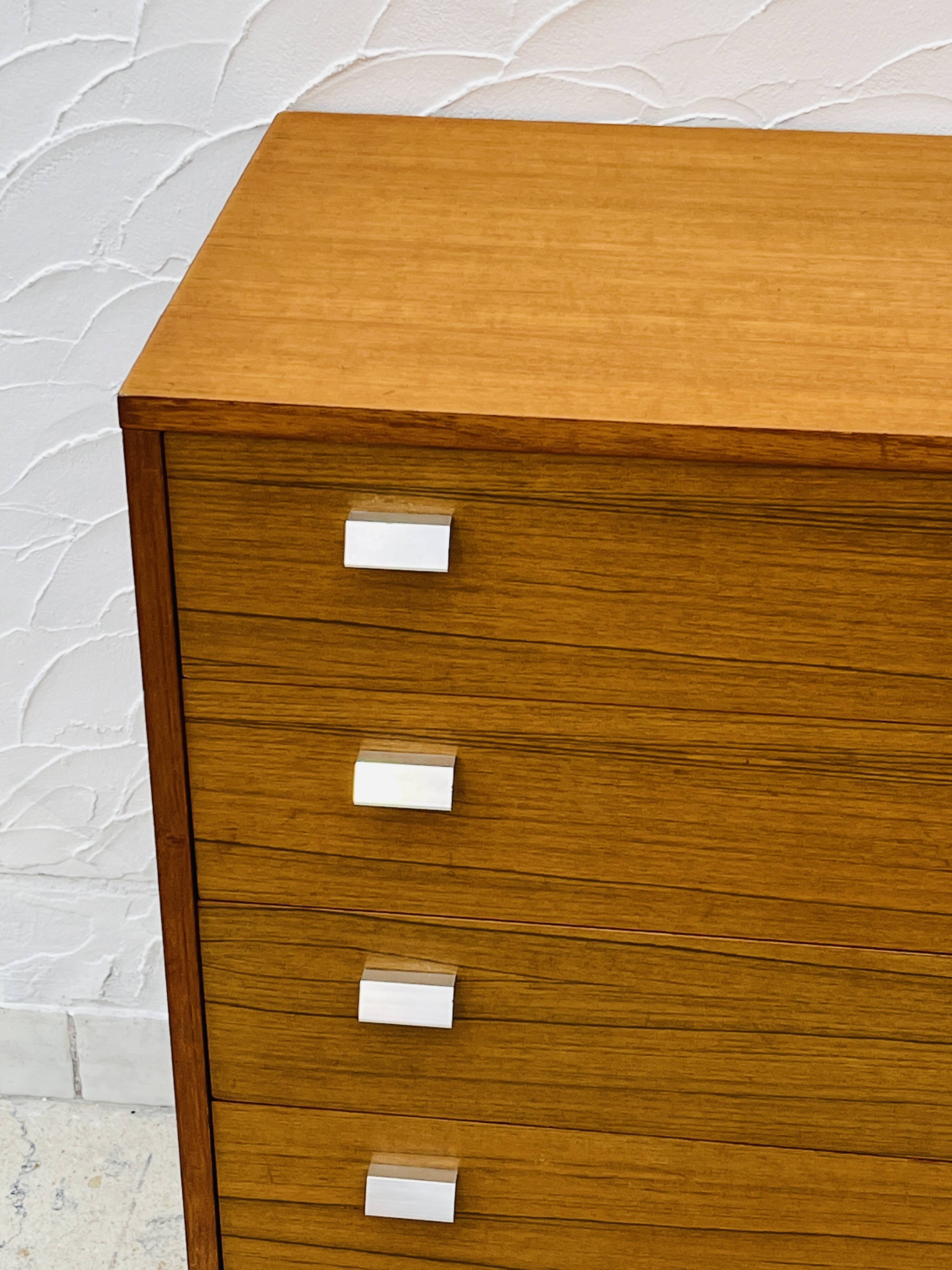 Vintage teak chest of drawers with 4 drawers from the 1960s in G-Plan style.