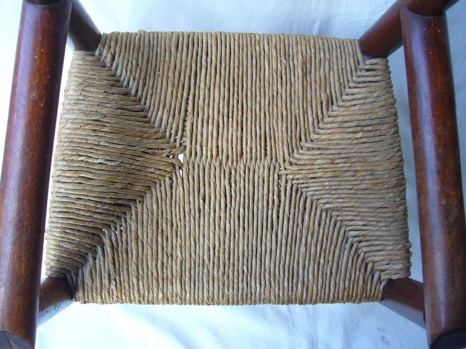 Wooden child's chair and mulched seat