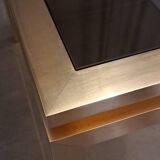 Table basse Guy Lefevre en laiton et verre