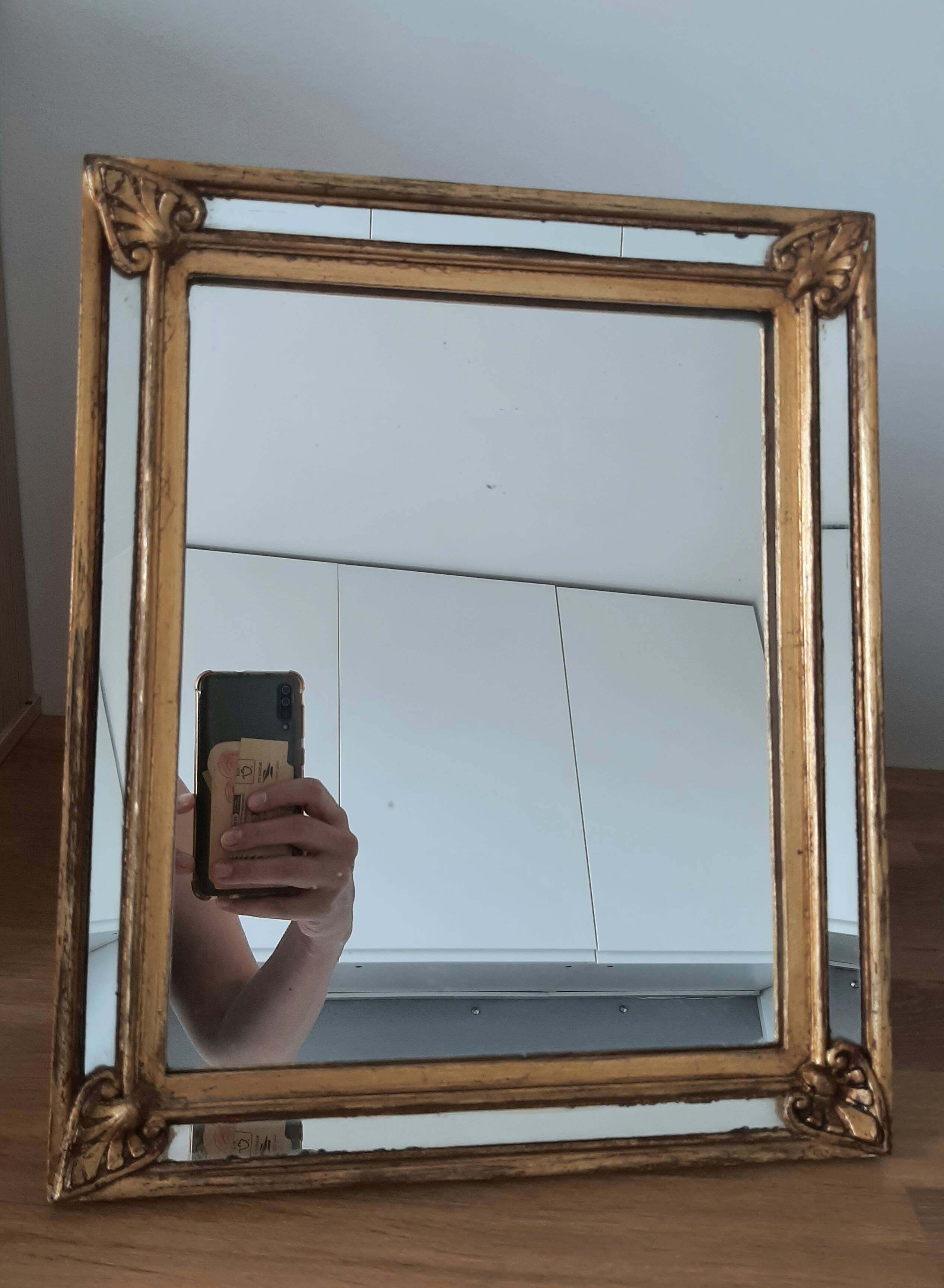 Gold-framed mirror