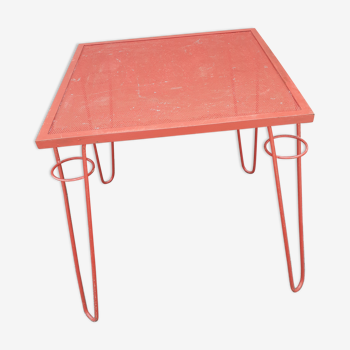 Perforated metal table