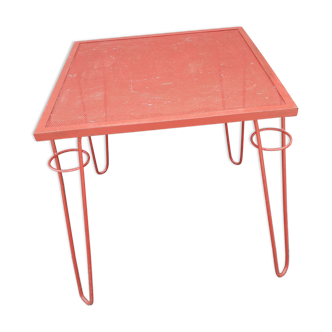 Perforated metal table
