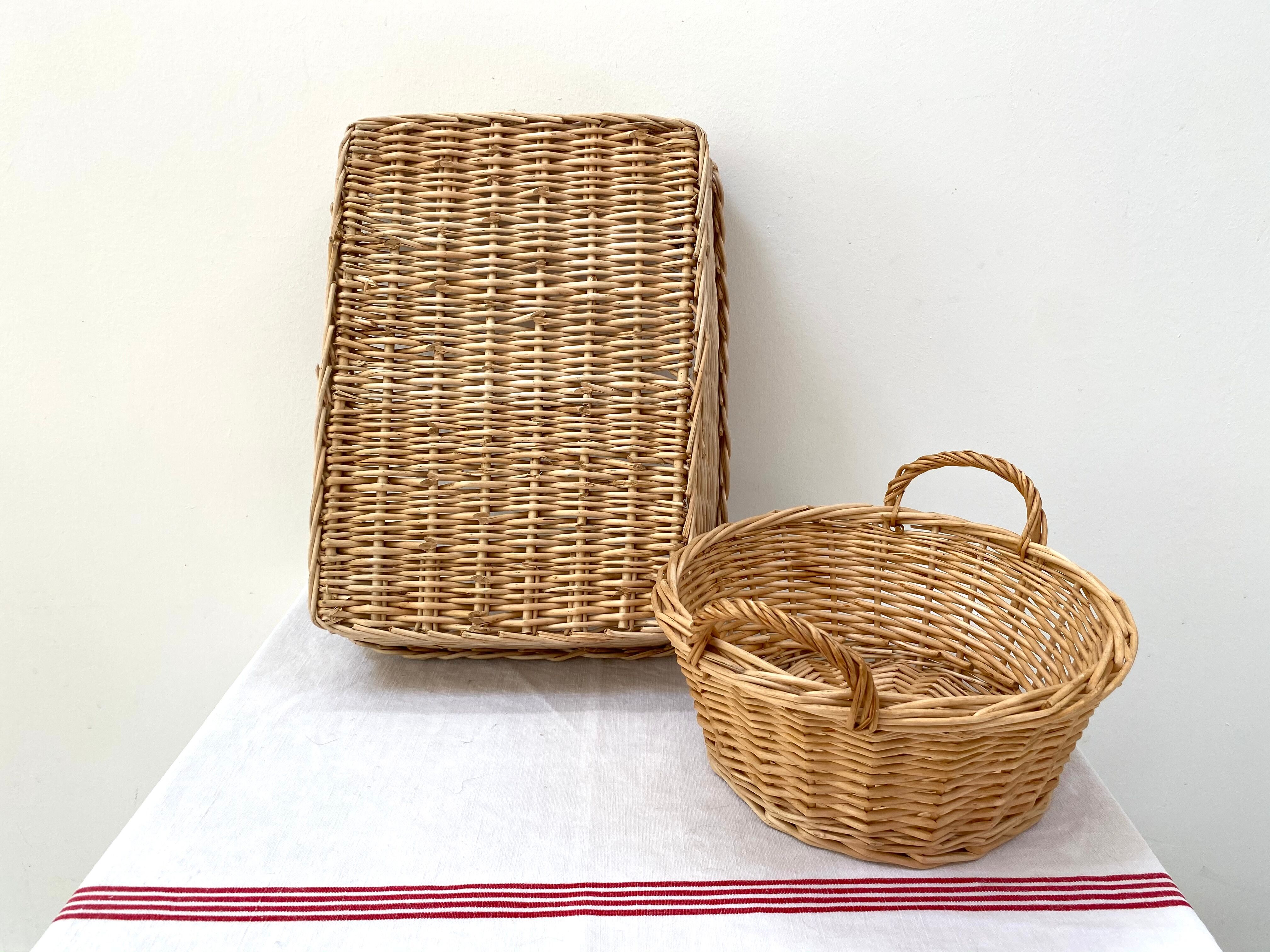 Duo of baskets in braided rattan