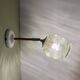 Vintage amber glass globe wall light
