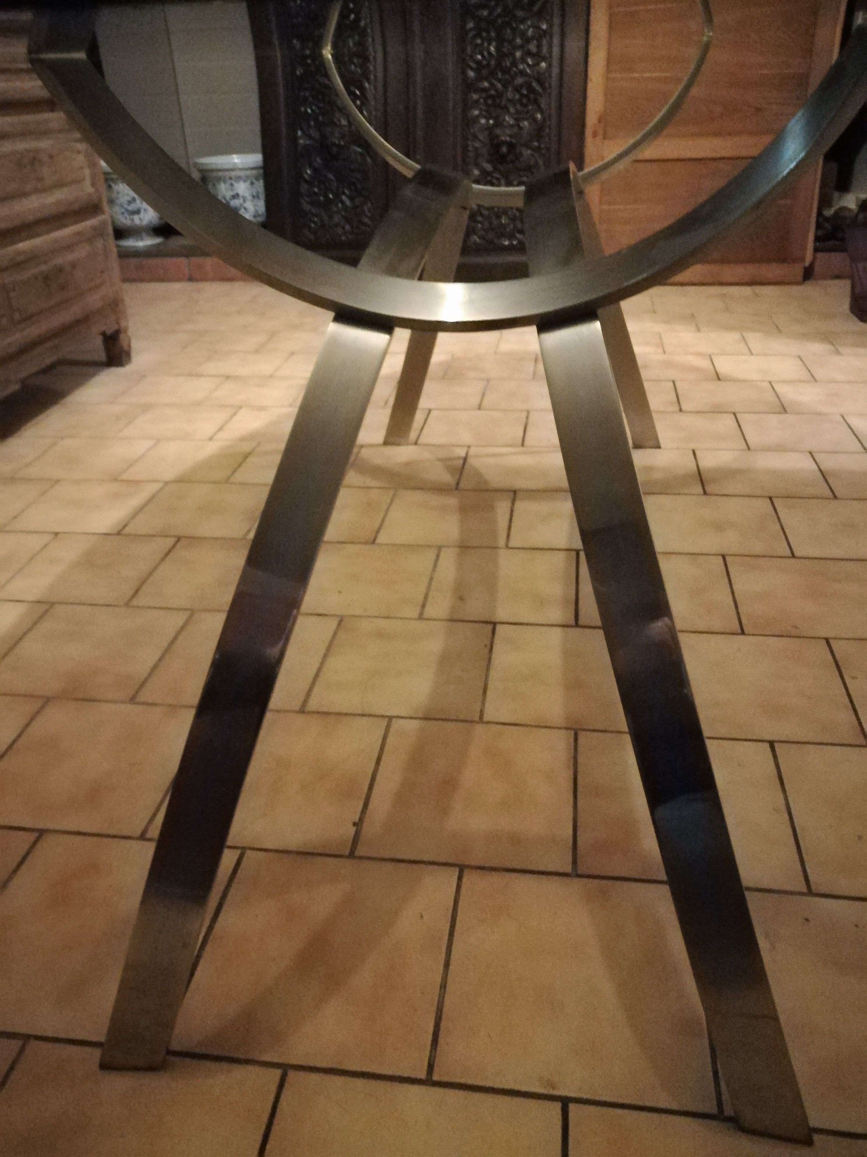 Oval table in chrome steel and smoked glass