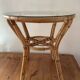 Table basse vintage en rotin et verre