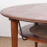 Danish round coffee table in teak, brass and cane, model FD 515 by Peter Hvidt 1960.