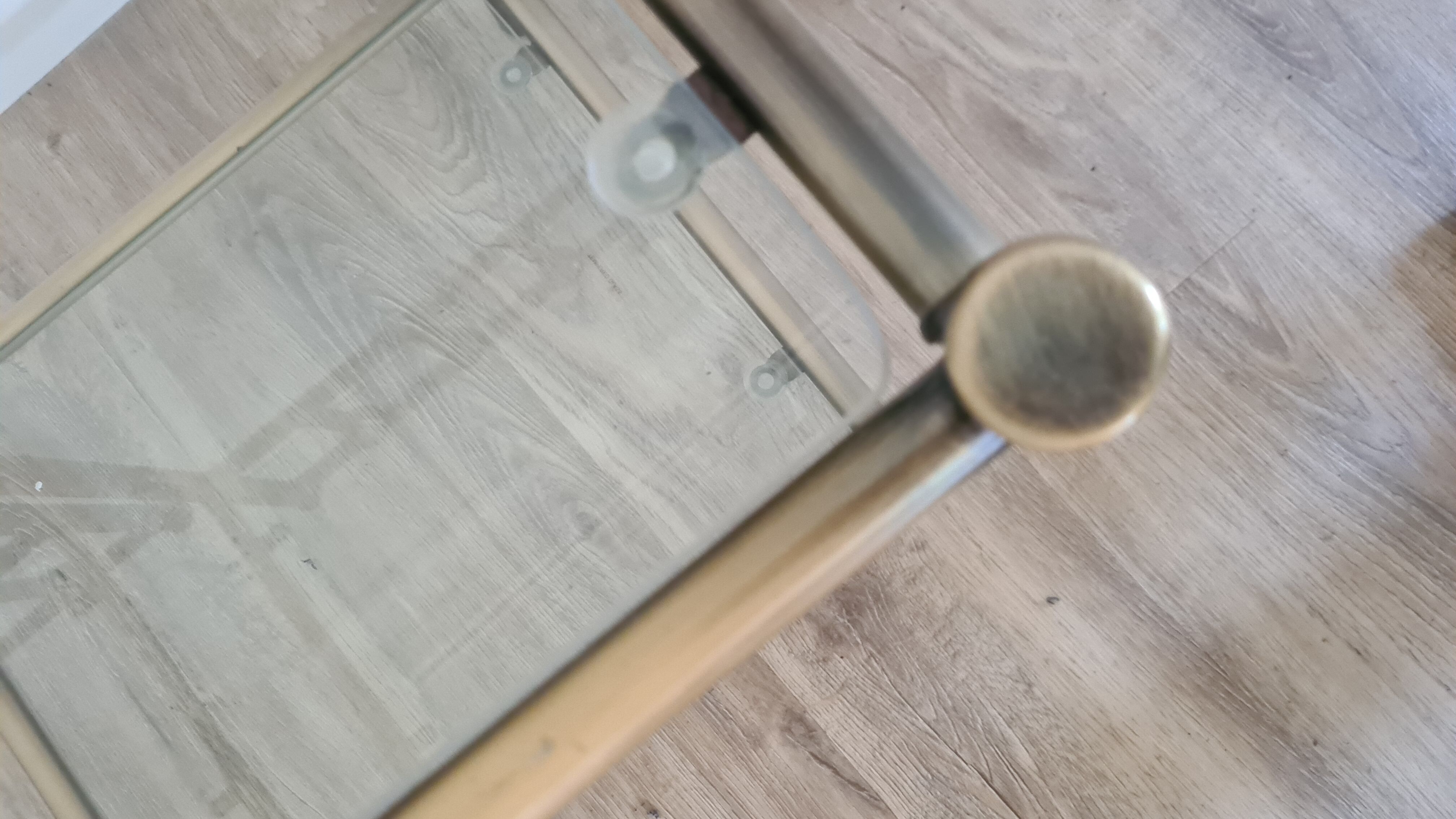 Old pair of glass and brass bedside tables, 80s