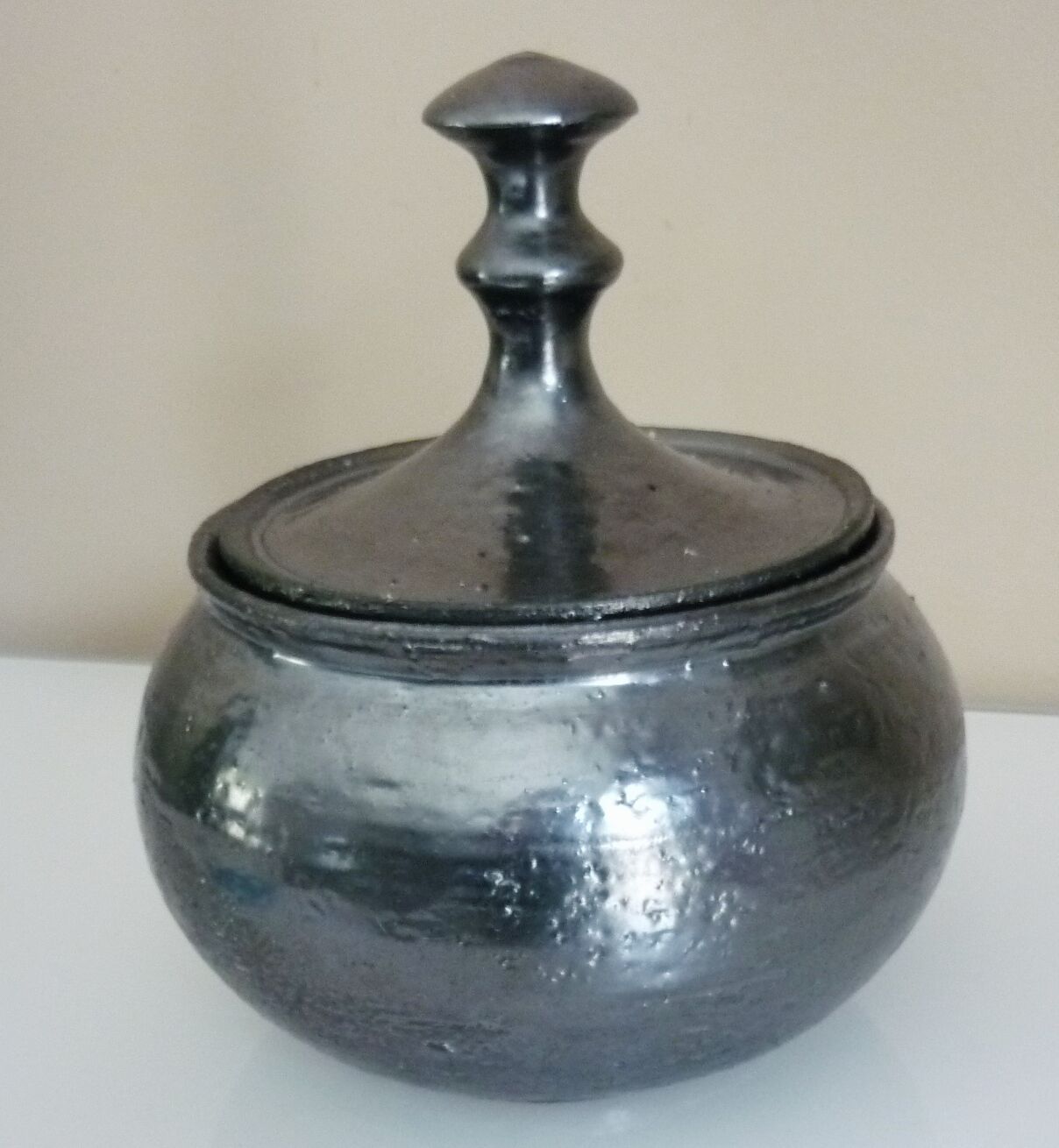 Black metal glazed ceramic bonbonnière, signed Jean Marais Vallauris