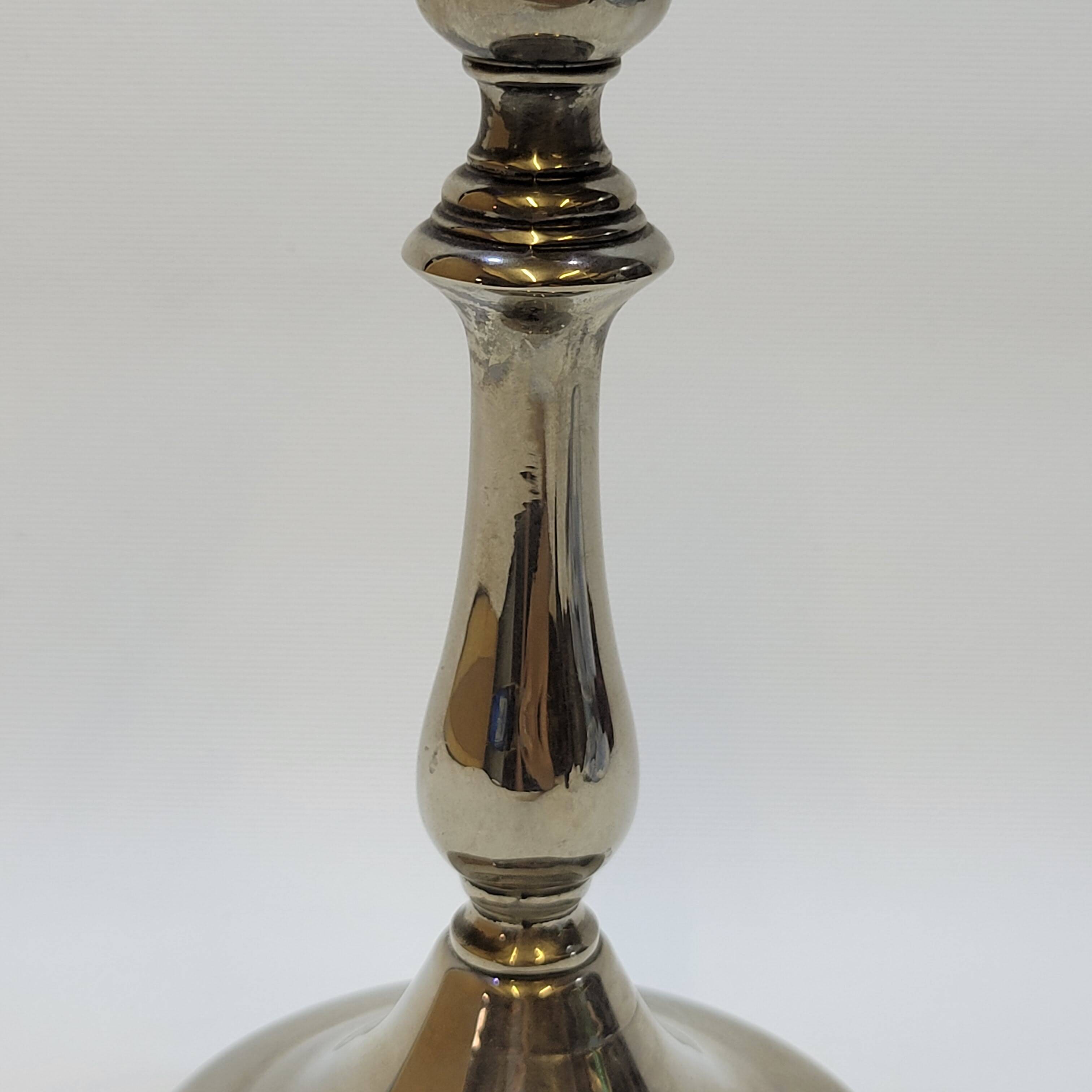 Old candle holder in silver metal