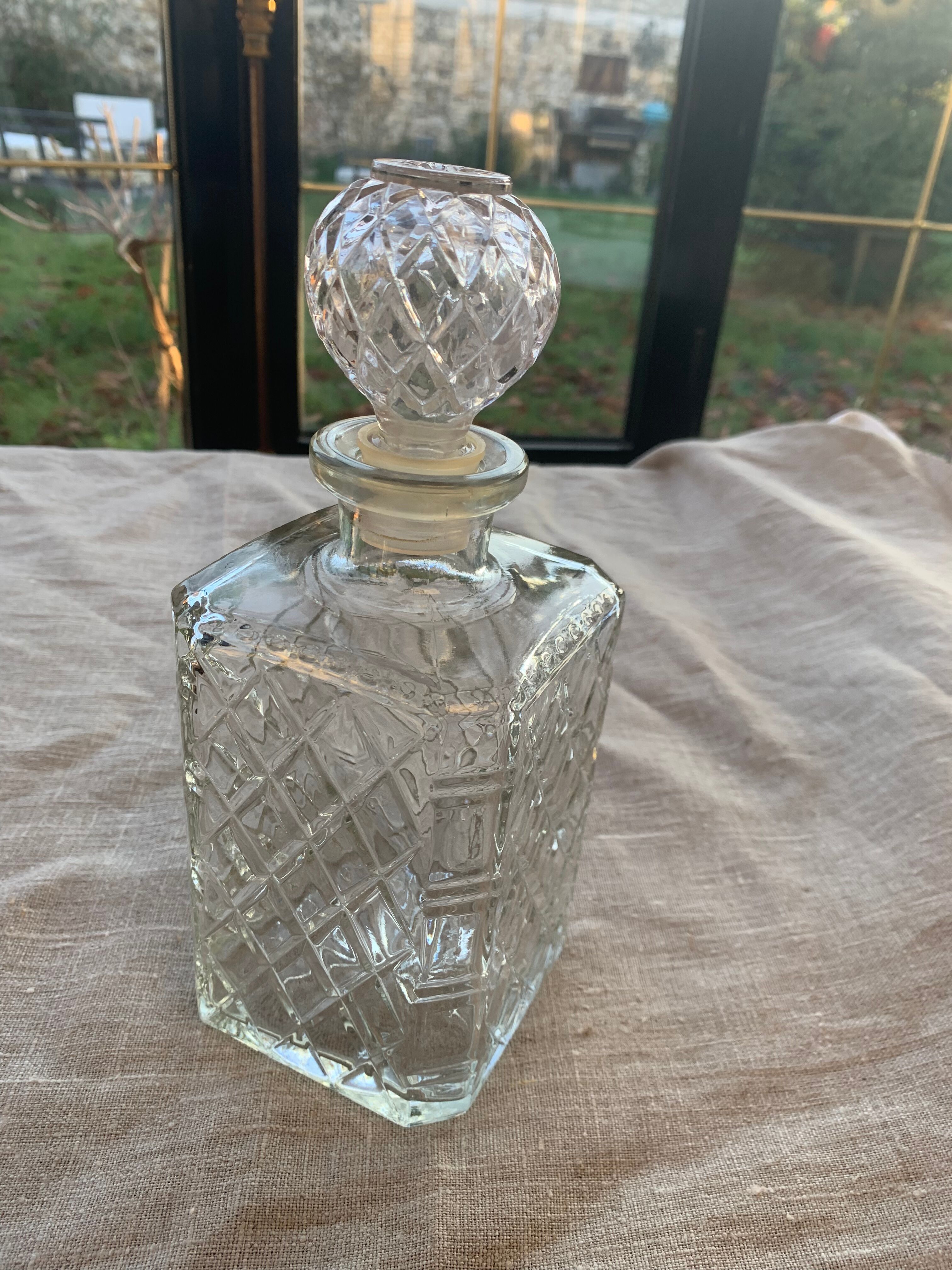 Vintage transparent molded glass whisky decanter