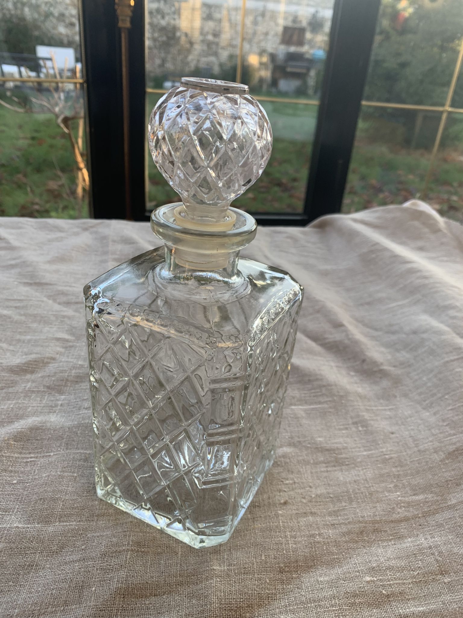 Vintage transparent molded glass whisky decanter