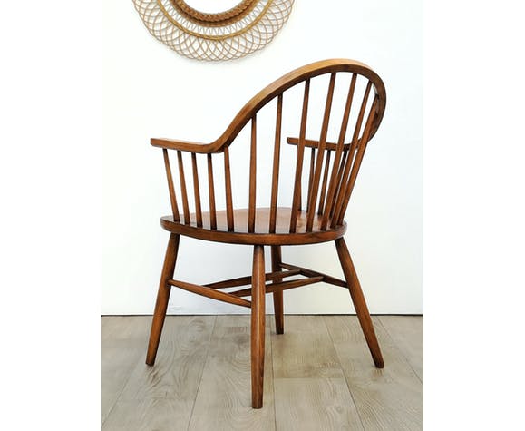 Wooden armchair with bars