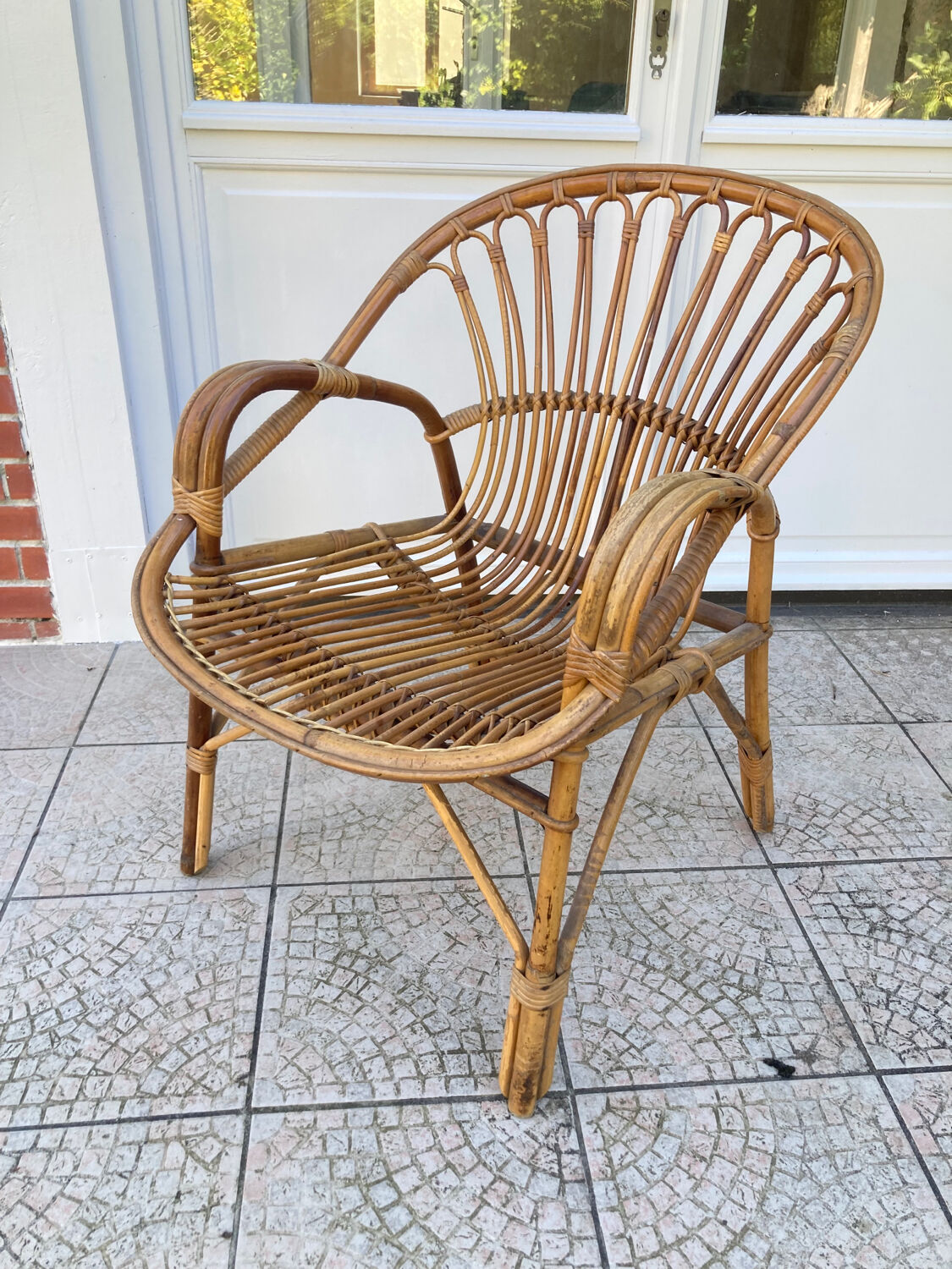 Vintage shell rattan armchair