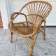 Vintage shell rattan armchair