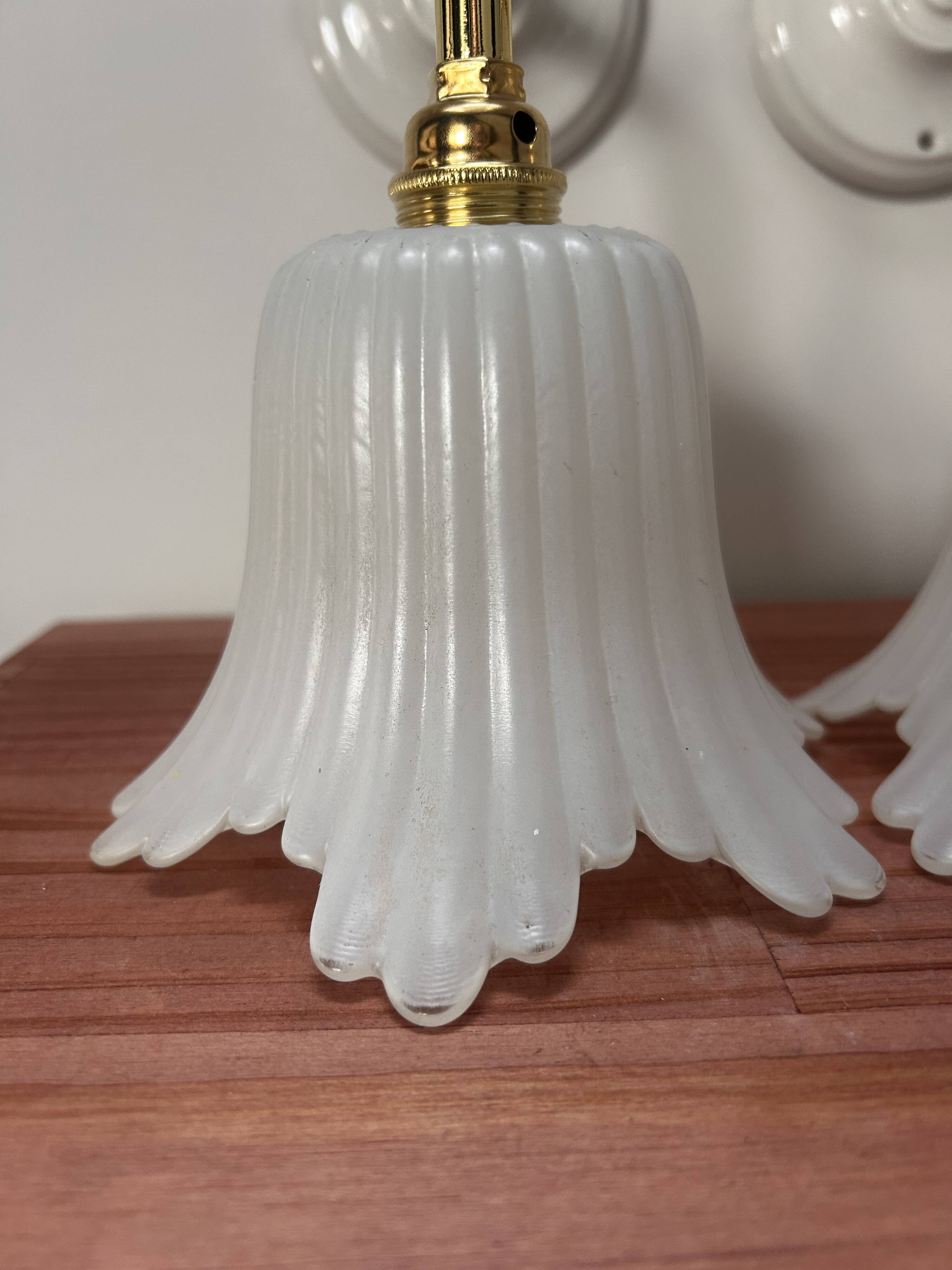 Pair of white tulip wall sconces