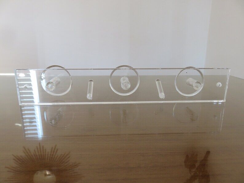 Wall coat rack in transparent plexiglass 3 hooks. 1980