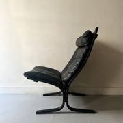 Scandinavian black leather armchair Siesta by Ingmar Relling, design 1970.