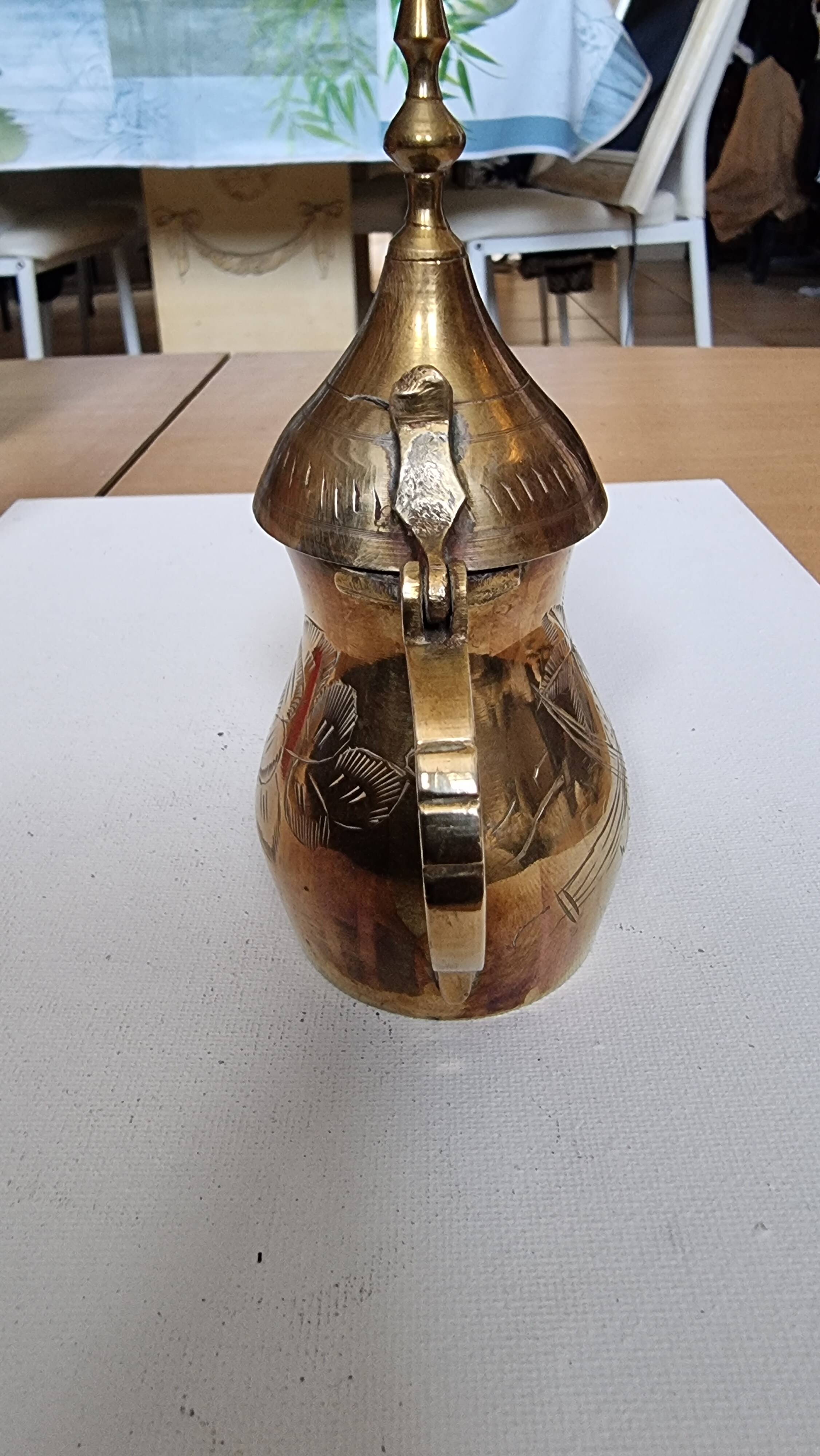 Small carved brass pourer