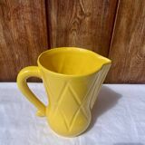 Vintage lemon yellow ceramic pitcher.