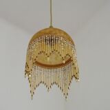 Vintage French amber mottled glass hanging ceiling light with beaded fringe.