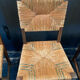 Four straw chairs