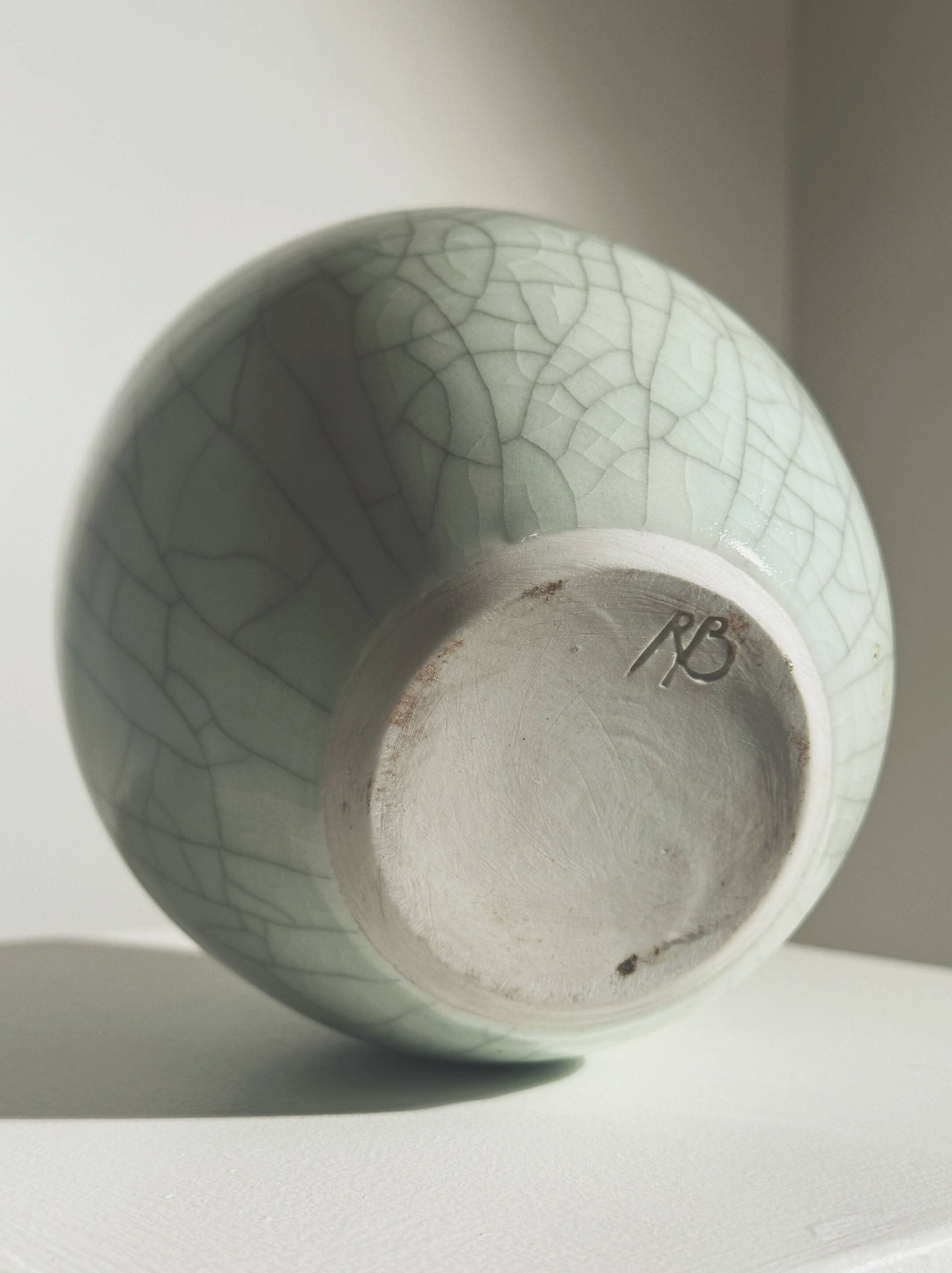 White ceramic vase by Roland Breton