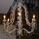 Large cage chandelier in aged metal.