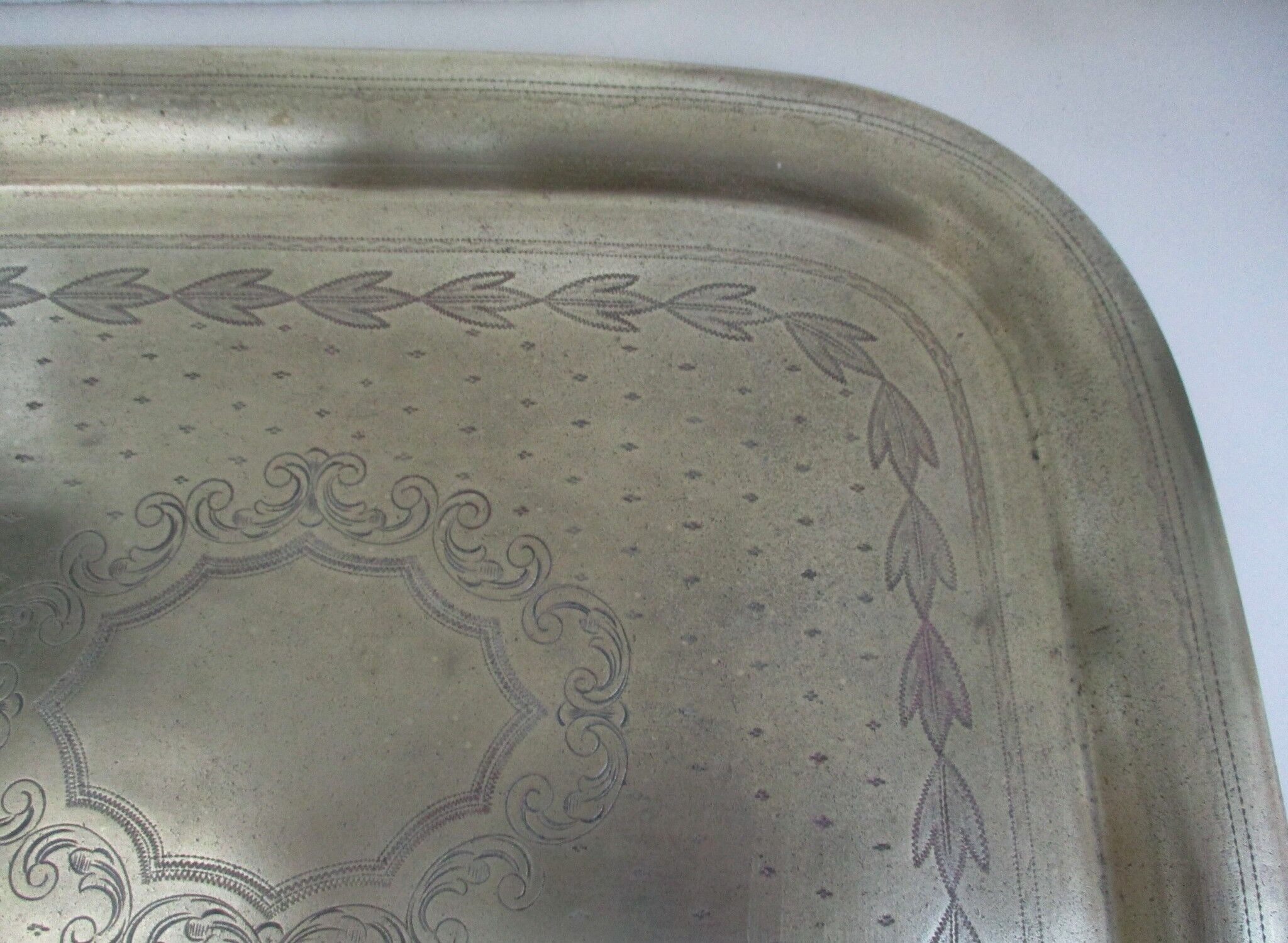 Rectangular brass top with engraved decoration