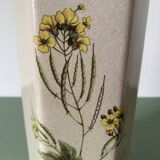Faceted stoneware bottle signed La Cigogne, floral model (Diplotaxis muralis)