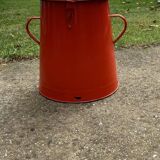Red enamelled metal bin from the 1950s, with a lockable lid and side handles.